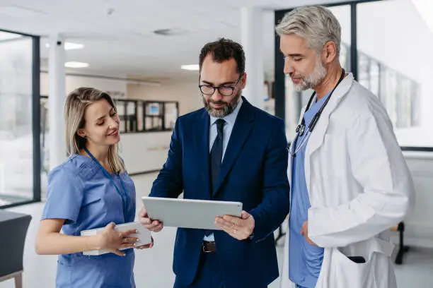 A healthcare professional using a secure IT system in a medical office.